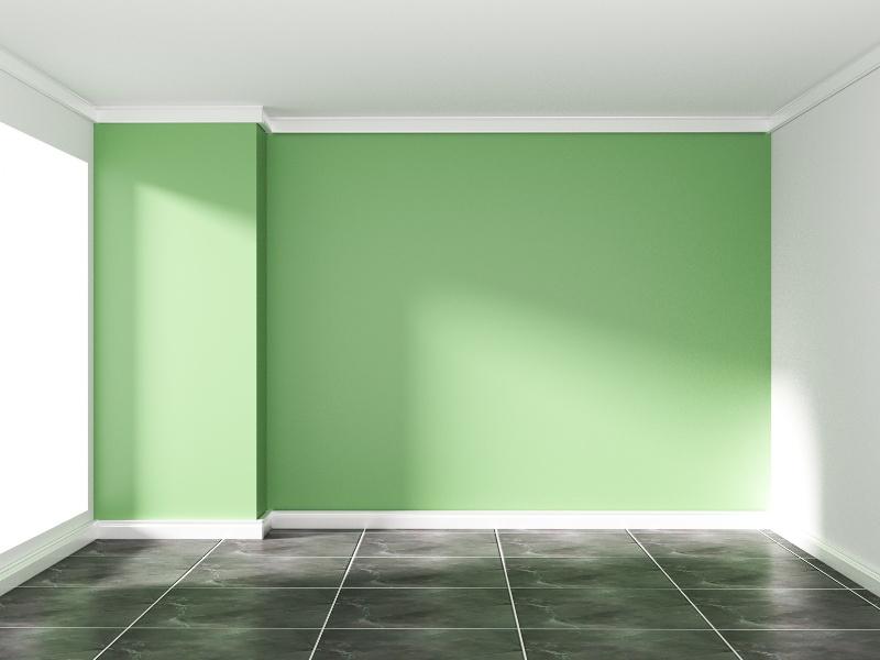 sala colorida com parede verde e roda teto branco